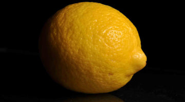 Ripe lemon with a black background